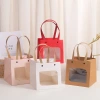 Kraft paper with an open smiling face, creative cartoon kraft paper bag, shopping clothing, kraft paper handbag, gift packaging details Picture